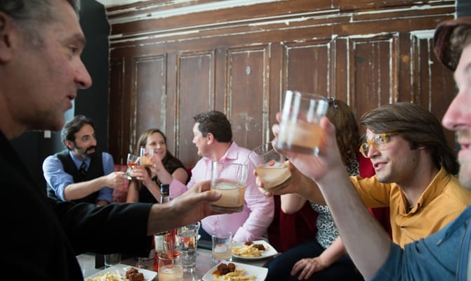 Guests making a toast with Poquito Picante at Burritt Room