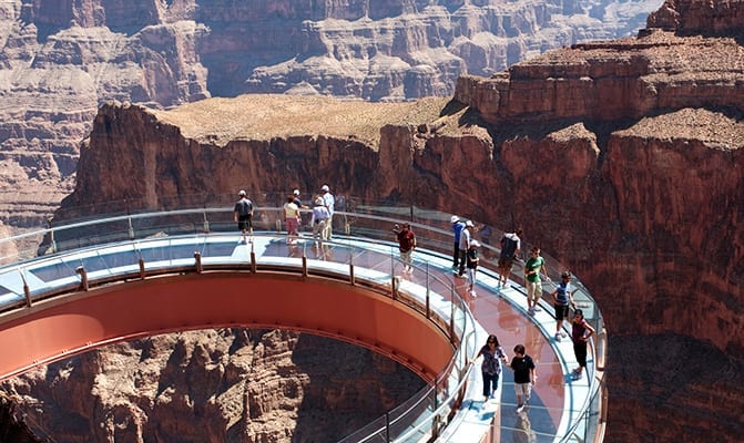 Walk across the amazing Skywalk glass bridge and see the grand canyon far below your feet